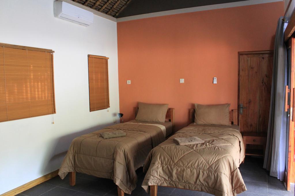Albany Home Stay Kuta  Szoba fotó